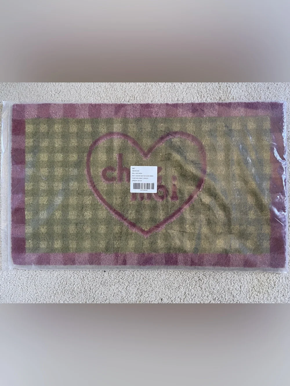 Chez Moi Gingham Coir Printed Door Mat from Anthropologie.